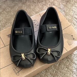 Mini Melissa Black Dress Shoes with Gold Bow